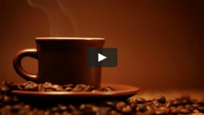 Coffee Cup and Saucer Amidst Coffee Beans